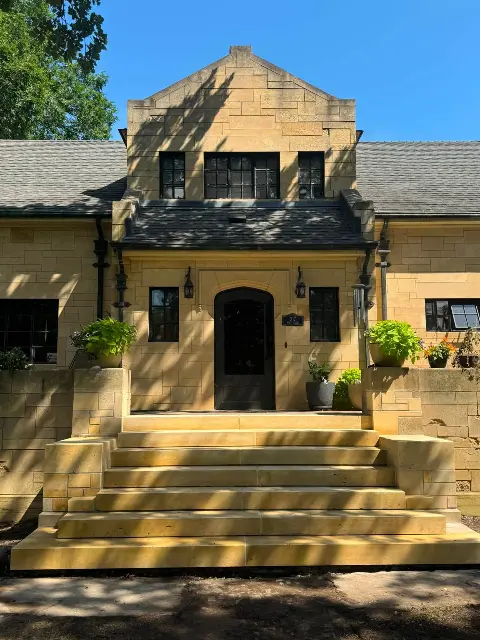 Elegant stone steps leading to a historic home entrance